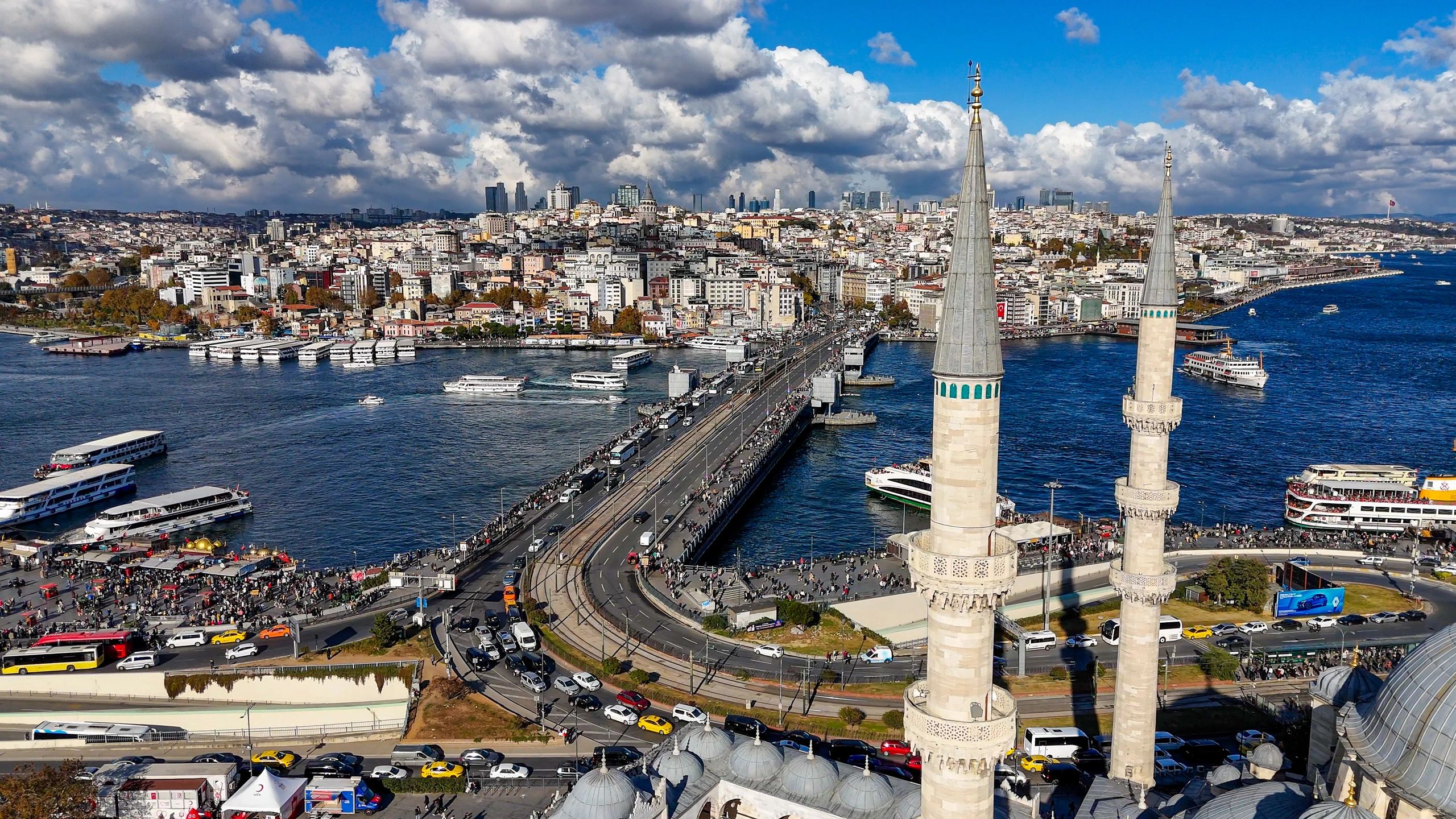 Istanbul waterfront and bridge with boats on the Golden Horn.