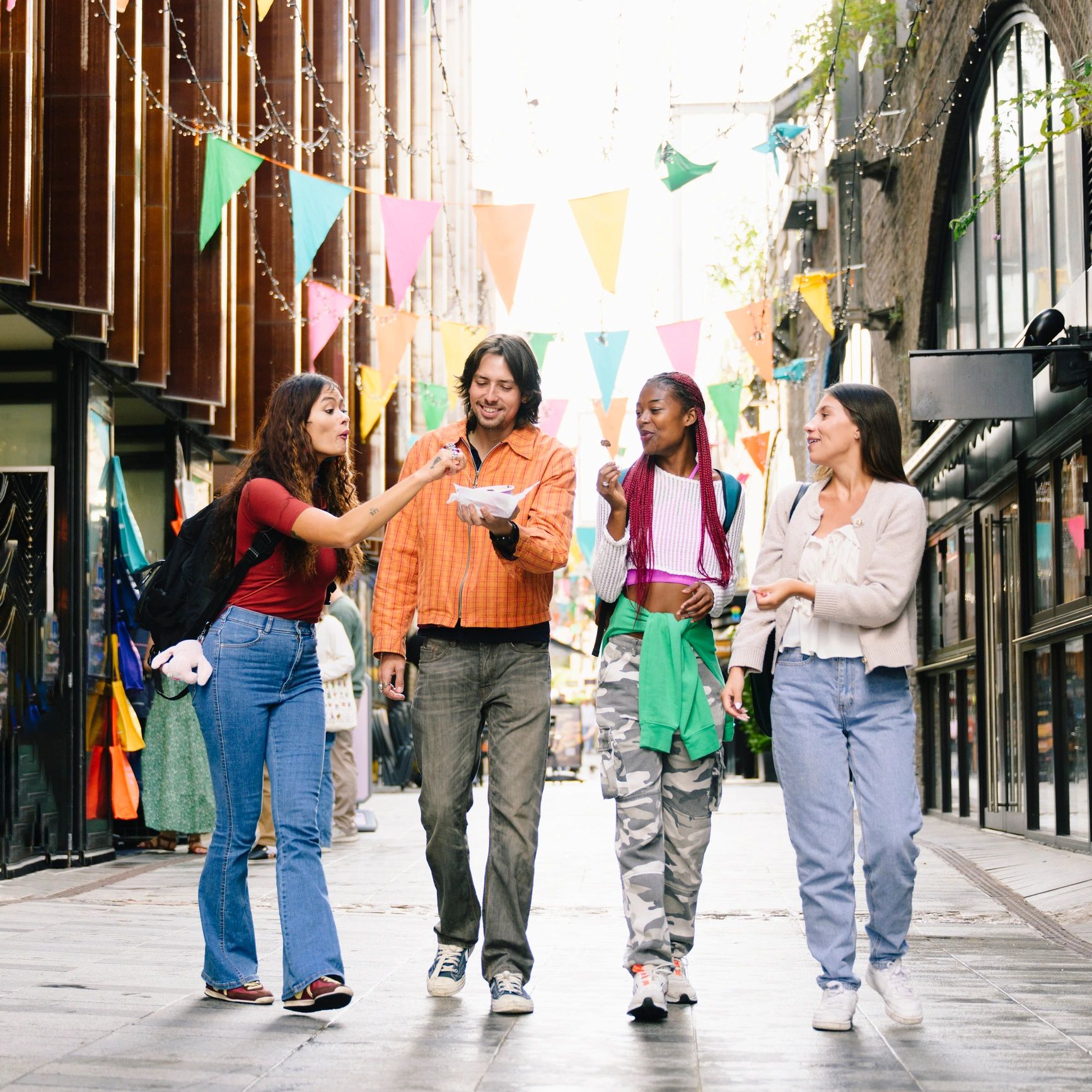 Group of friends walking together while traveling
