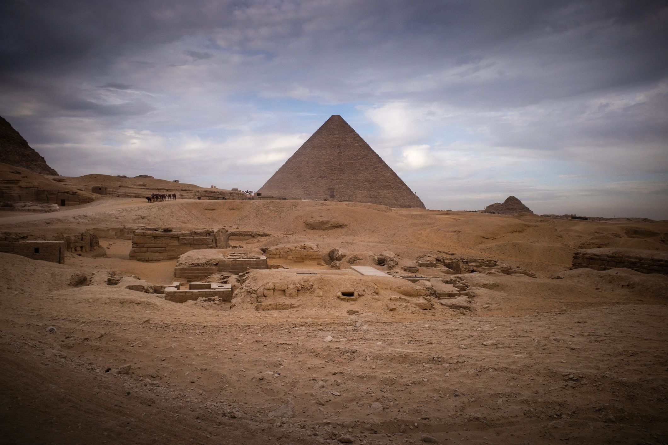 Great Pyramid of Giza under dramatic sky